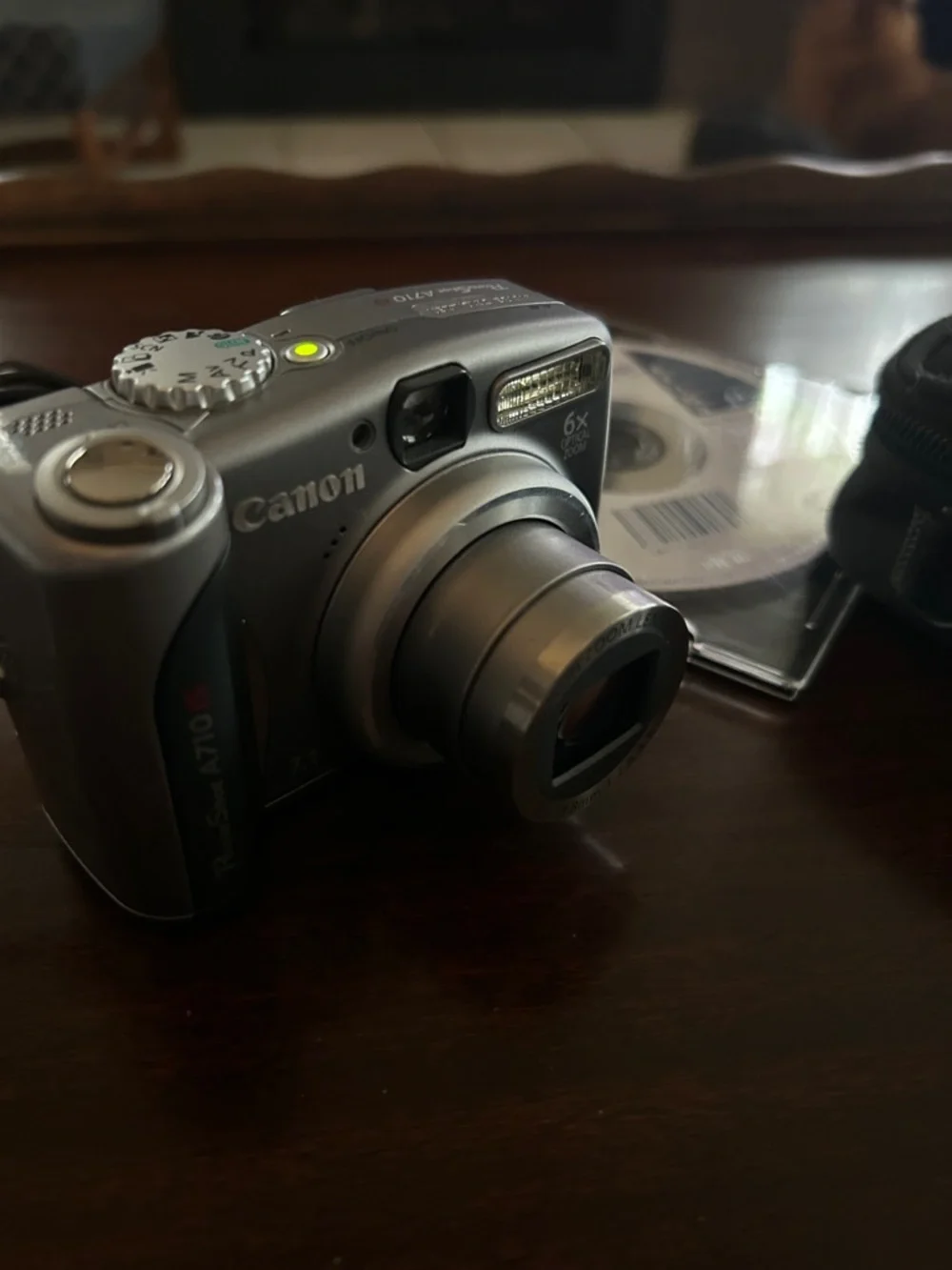 Canon Silver A710 Point-and-Shoot Digital Camera with Black Case and Cable